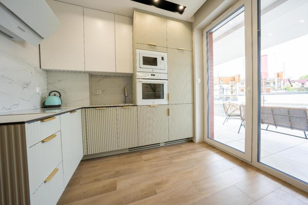 Rodzinne Apartamenty Bardzo Blisko Plazy Rewal Esterno foto
